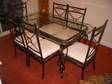DINING TABLE AND 6 CHAIRS GLASS TOP AND IN VGC This is a....